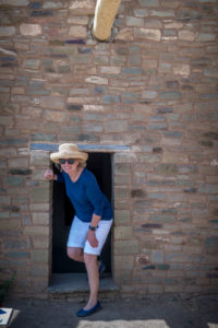 Shelli emerges while exploring the Aztec Ruins